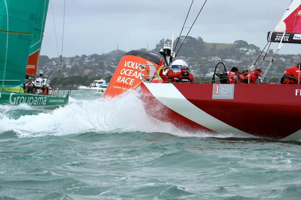 Rooster tails from camper as she spins around the top mark with Dean Barker and Toni Stewart riding in the back - Volvo Ocean Race Auckland - Start March 18,2012 © Richard Gladwell www.photosport.co.nz